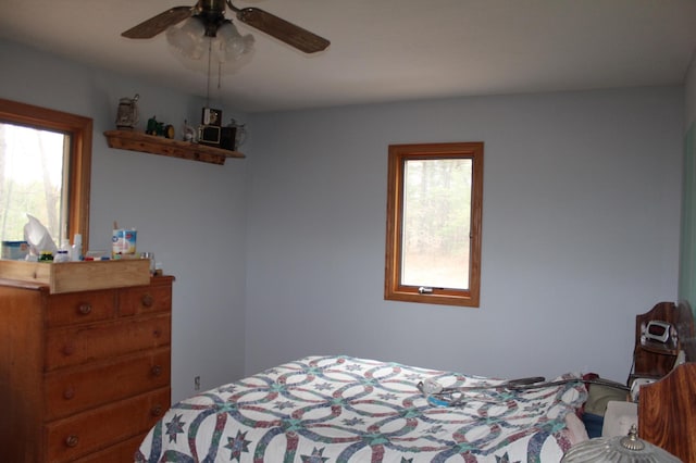 14879 Benson Rd, Grantsburg, WI 54840 - bedroom featuring a ceiling fan