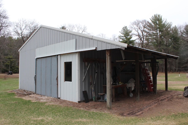 14879 Benson Rd, Grantsburg, WI 54840 - view of pole building featuring a lawn