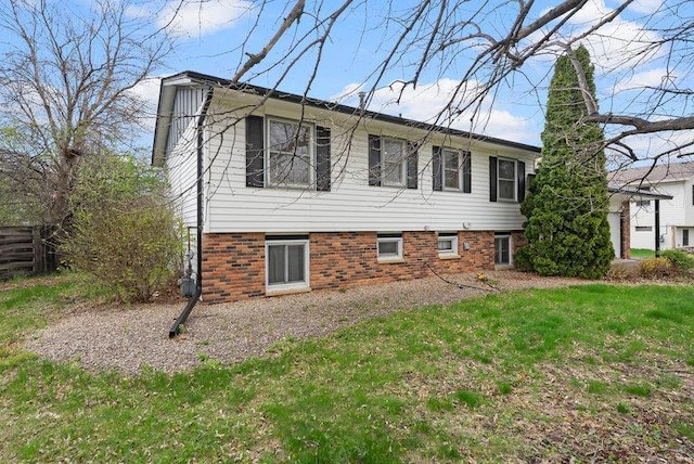 view of home's exterior featuring a yard