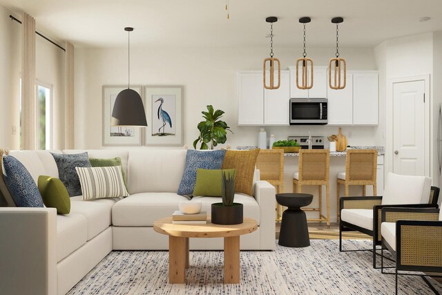 10213 Twin Lakes Pkwy NW, Elk River, MN 55330 - living room featuring light wood-style floors