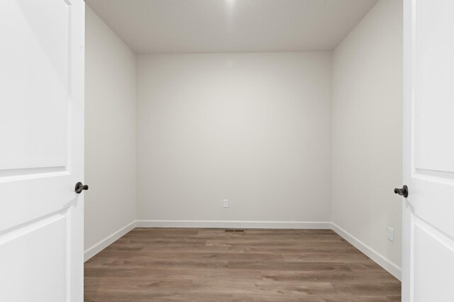 10213 Twin Lakes Pkwy NW, Elk River, MN 55330 - unfurnished room with light wood finished floors