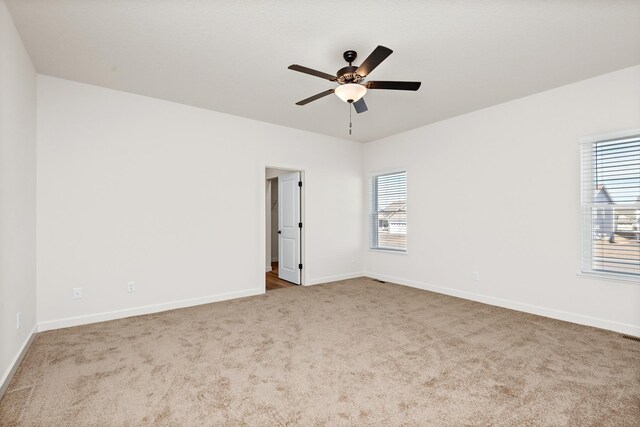 10213 Twin Lakes Pkwy NW, Elk River, MN 55330 - unfurnished room featuring carpet and a ceiling fan