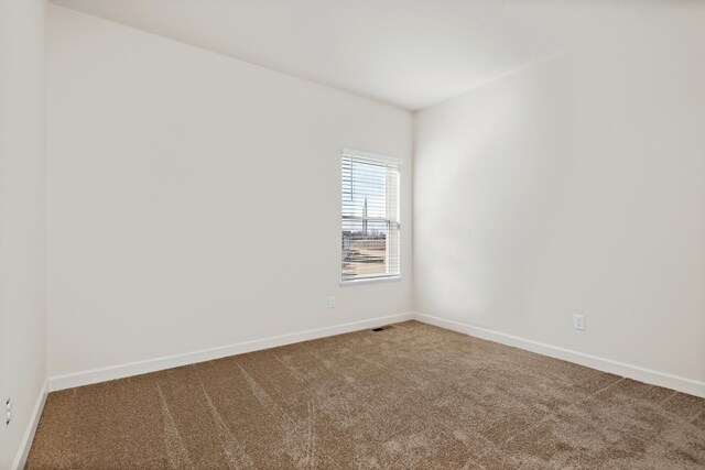 10213 Twin Lakes Pkwy NW, Elk River, MN 55330 - spare room with carpet floors