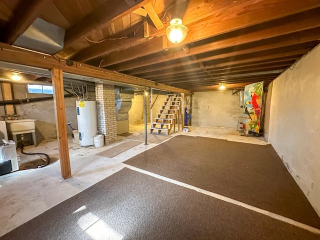 basement with stairway and water heater