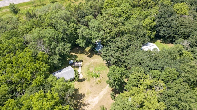 bird's eye view featuring a forest view