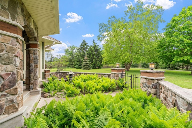 374 Indigo Trl, Troy Twp, WI 54022 - view of grassy yard with view of wooded area