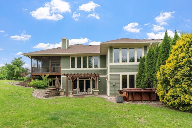 374 Indigo Trl, Troy Twp, WI 54022 - rear view of property featuring a hot tub, a patio, a sunroom, a lawn, and a chimney