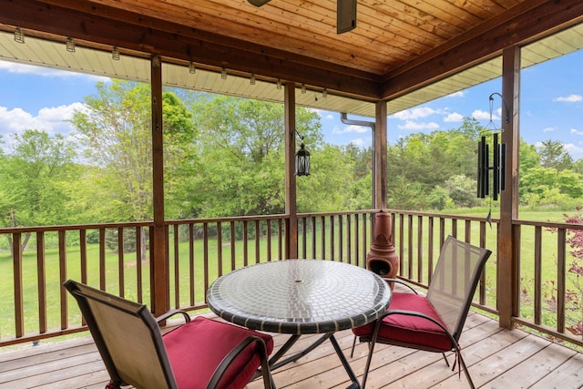 374 Indigo Trl, Troy Twp, WI 54022 - deck featuring a yard, view of wooded area, and a ceiling fan