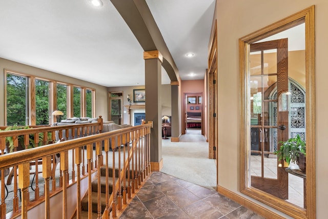 374 Indigo Trl, Troy Twp, WI 54022 - corridor featuring baseboards, arched walkways, dark colored carpet, recessed lighting, and an upstairs landing