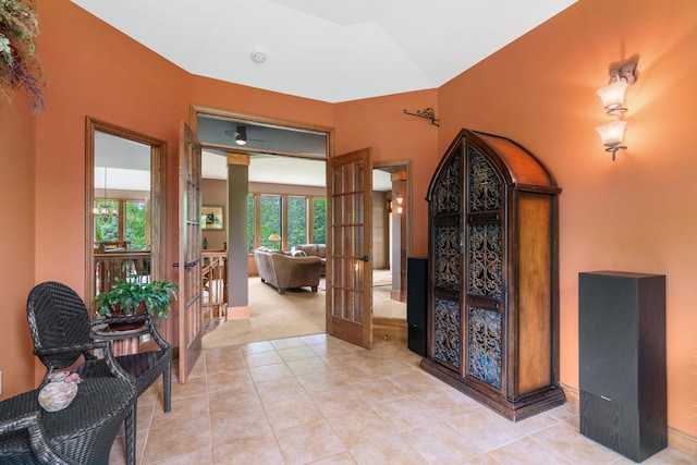 374 Indigo Trl, Troy Twp, WI 54022 - corridor featuring french doors, light tile patterned floors, and baseboards