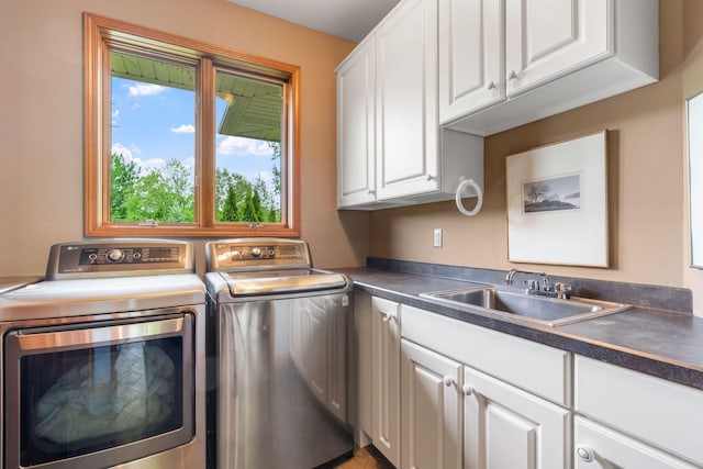 374 Indigo Trl, Troy Twp, WI 54022 - laundry room featuring washer and clothes dryer and cabinet space