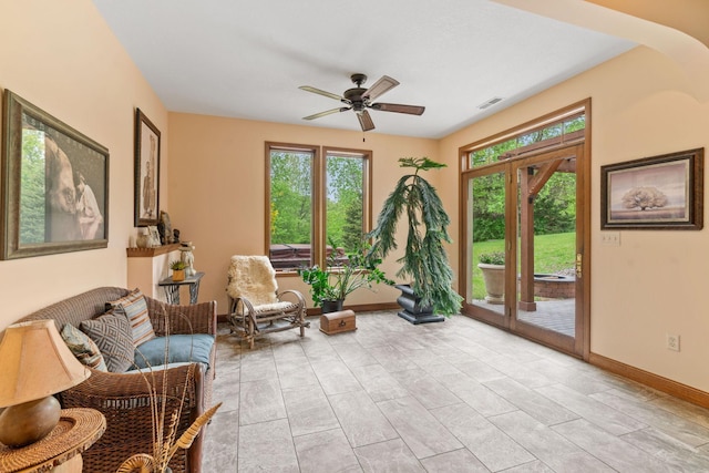 374 Indigo Trl, Troy Twp, WI 54022 - living area with a ceiling fan and baseboards