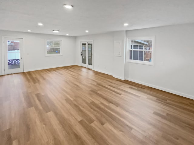 1005 Honeysuckle Ln, Farmington, MN 55024 - interior space with recessed lighting, light wood-style flooring, and baseboards