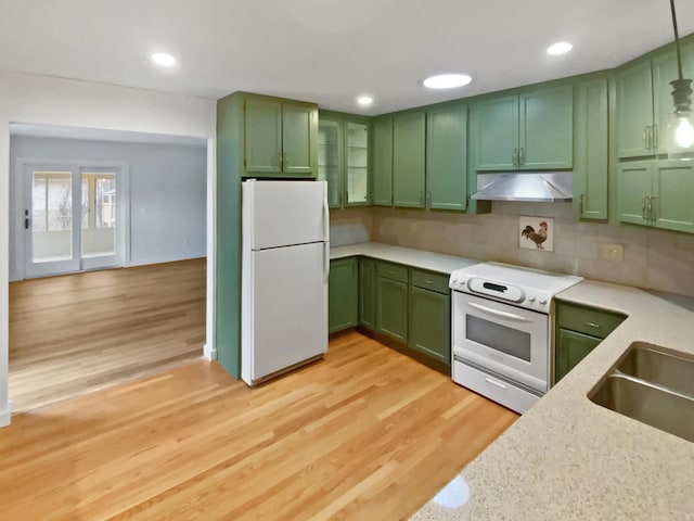 1005 Honeysuckle Ln, Farmington, MN 55024 - kitchen featuring green cabinets, light wood-style flooring, under cabinet range hood, and white appliances