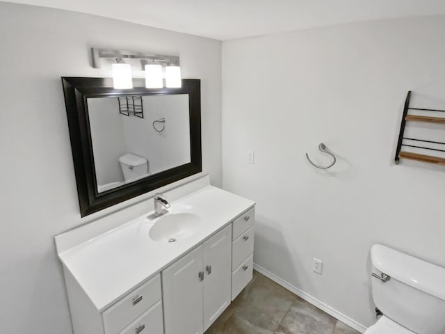 1005 Honeysuckle Ln, Farmington, MN 55024 - bathroom featuring toilet, vanity, and baseboards