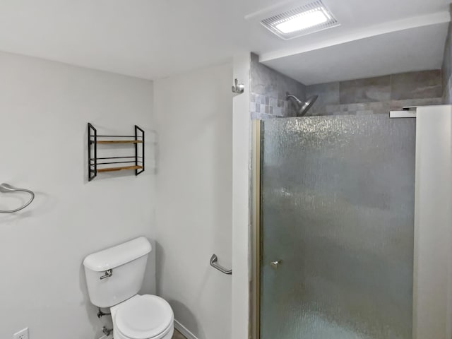 1005 Honeysuckle Ln, Farmington, MN 55024 - full bath featuring toilet, visible vents, a shower stall, and baseboards