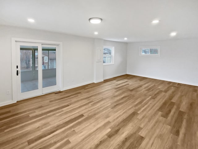 1005 Honeysuckle Ln, Farmington, MN 55024 - interior space featuring wood finished floors, recessed lighting, and baseboards
