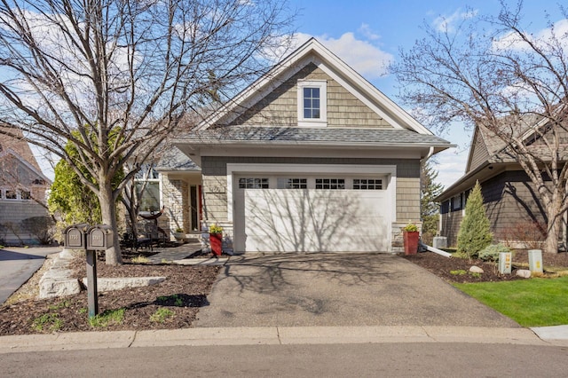 1760 Waterford Ct, Golden Valley, MN 55422 - craftsman-style house with a garage, a shingled roof, and aphalt driveway