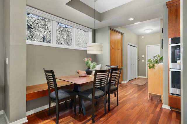 1760 Waterford Ct, Golden Valley, MN 55422 - dining room with plenty of natural light, wood finished floors, and baseboards