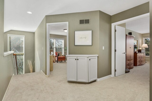 1760 Waterford Ct, Golden Valley, MN 55422 - hall featuring visible vents, baseboards, recessed lighting, vaulted ceiling, and light carpet