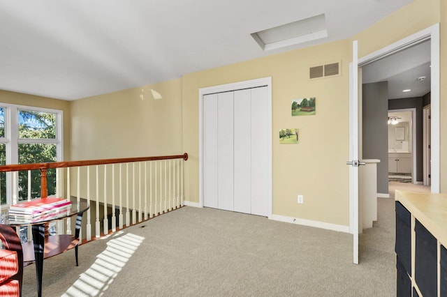 1760 Waterford Ct, Golden Valley, MN 55422 - interior space with baseboards, visible vents, attic access, and carpet