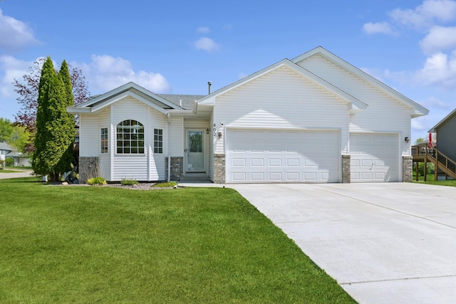 402 13th Ave NE, Buffalo, MN 55313 - ranch-style home with stone siding, a garage, driveway, and a front yard
