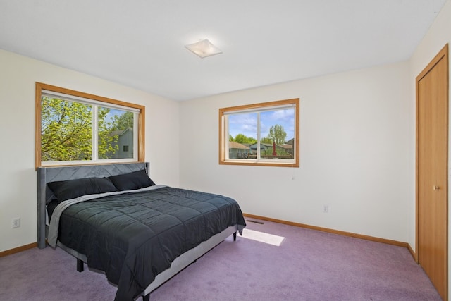 402 13th Ave NE, Buffalo, MN 55313 - carpeted bedroom with baseboards