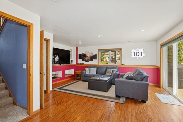 402 13th Ave NE, Buffalo, MN 55313 - living area with wood finished floors, stairway, recessed lighting, and baseboards