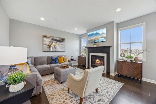 4343 Corn Silk Ln, Woodbury, MN 55129 - living area with a premium fireplace, wood finished floors, and recessed lighting
