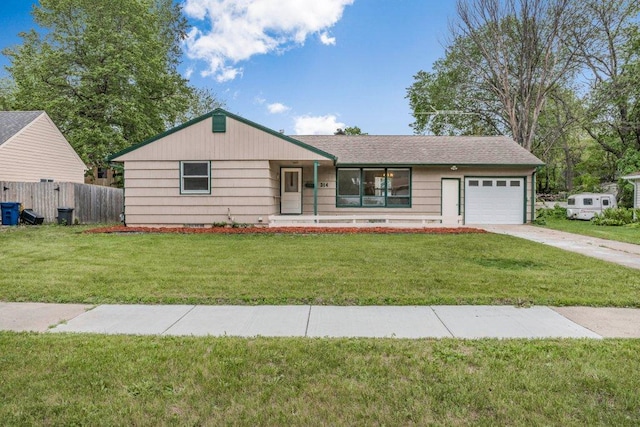314 Orchard St N, Northfield, MN 55057 - ranch-style house featuring an attached garage, concrete driveway, and a porch