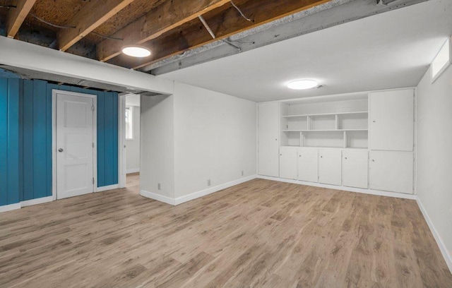 314 Orchard St N, Northfield, MN 55057 - finished below grade area with baseboards and light wood-type flooring