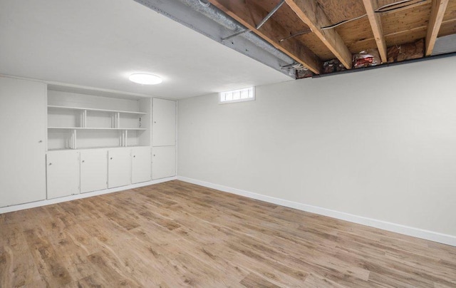 314 Orchard St N, Northfield, MN 55057 - basement with light wood finished floors and baseboards