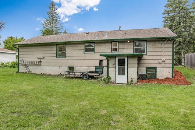 314 Orchard St N, Northfield, MN 55057 - back of property with a shingled roof and central AC