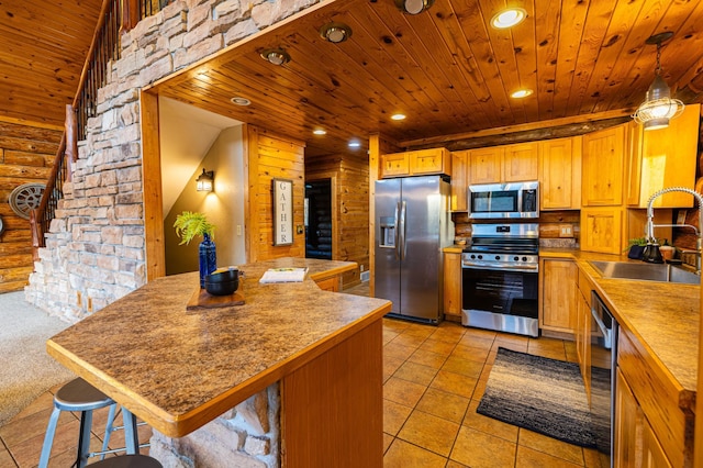2374 320th St, Forest Twp, WI 54005 - kitchen featuring recessed lighting, a sink, wooden ceiling, stainless steel appliances, and a peninsula
