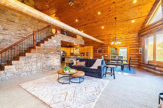 2374 320th St, Forest Twp, WI 54005 - living area with wooden ceiling, a wealth of natural light, carpet, and log walls