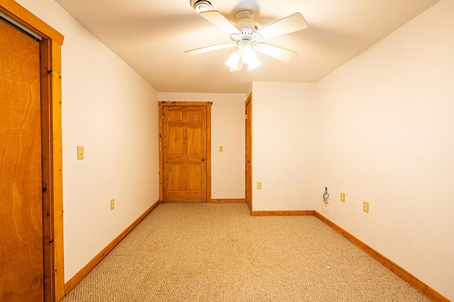 2374 320th St, Forest Twp, WI 54005 - spare room featuring ceiling fan, baseboards, and light carpet