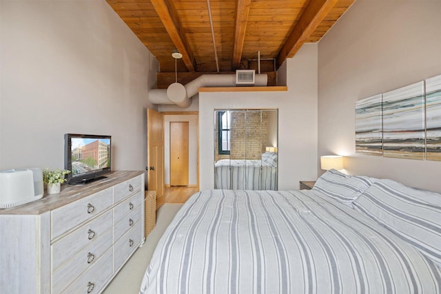bedroom featuring wooden ceiling and beamed ceiling