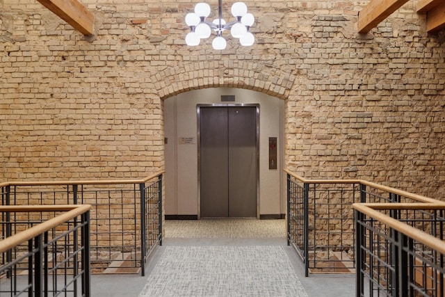 entrance to property featuring elevator