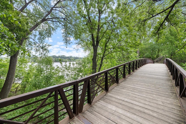 wooden deck with a water view