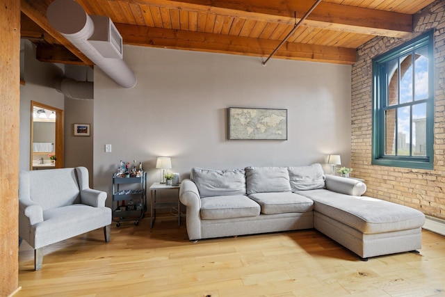 400 1st St Unit 507, Minneapolis, MN 55401 - living area with a wooden ceiling with exposed beams, plenty of natural light, light wood-style flooring, and brick wall