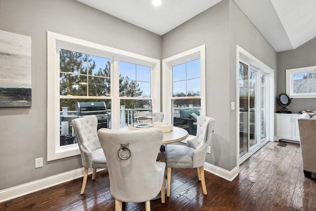 dining space featuring baseboards, recessed lighting, and wood-type flooring