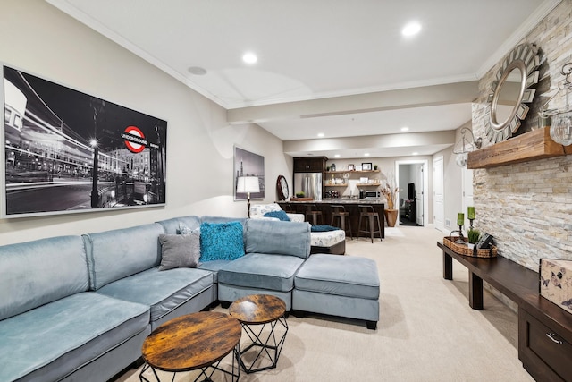 living room featuring ornamental molding, recessed lighting, and light carpet