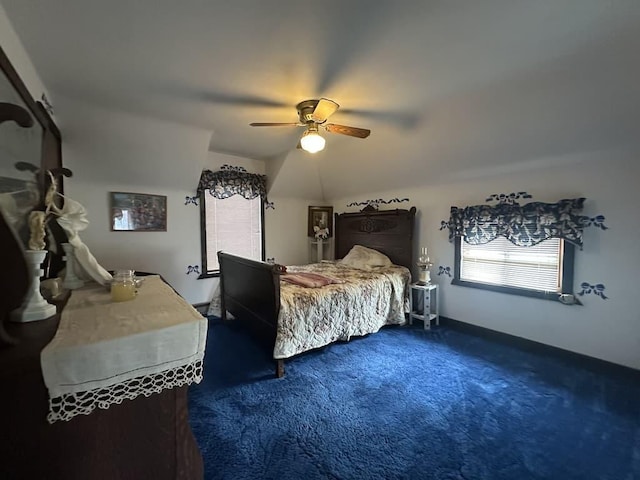 bedroom with ceiling fan and carpet