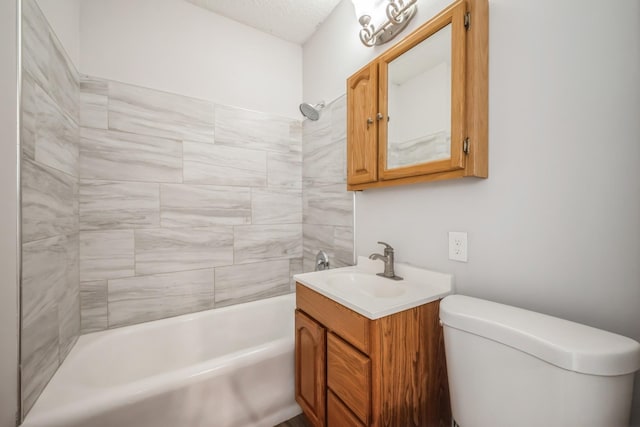 bathroom featuring vanity, toilet, and tub / shower combination