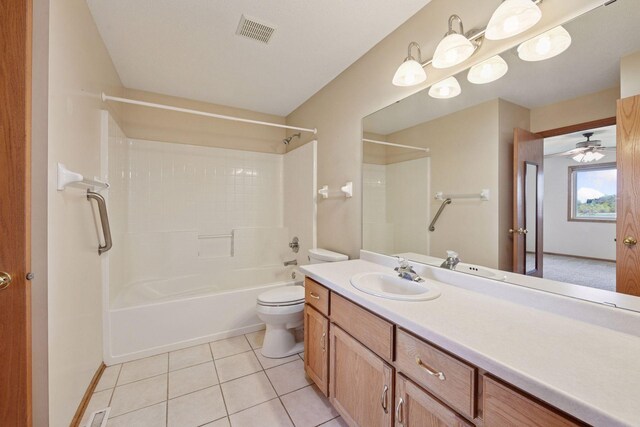 full bath with vanity, toilet, tile patterned floors, a ceiling fan, and visible vents