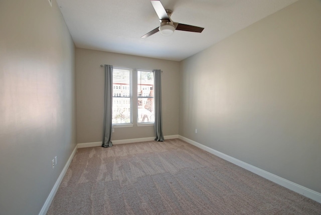 620 Main St N Unit 215, Stillwater, MN 55082 - empty room featuring a ceiling fan, baseboards, and carpet