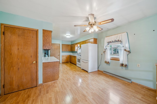 kitchen featuring light wood finished floors, brown cabinets, ceiling fan, white appliances, and baseboard heating
