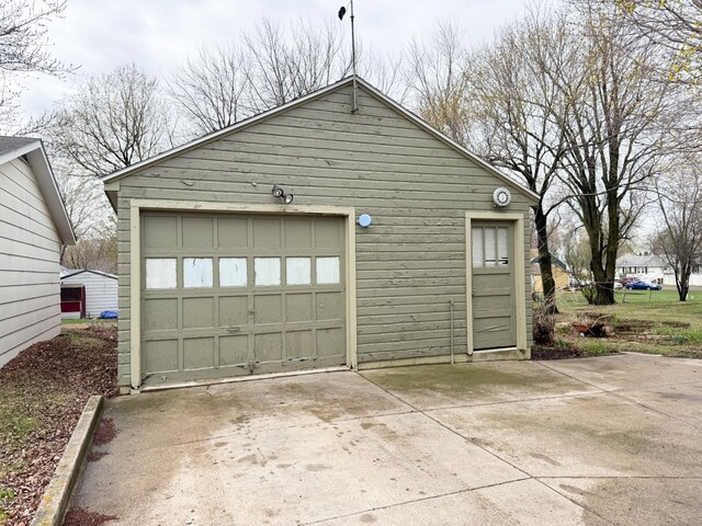 detached garage with driveway