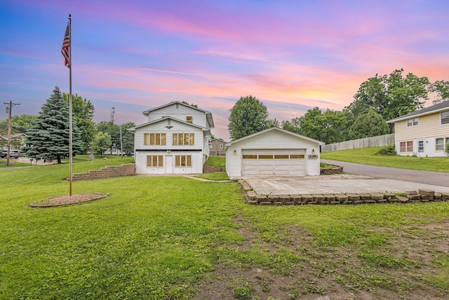 5870 Lynwood Blvd, Mound, MN 55364 - view of front of home featuring an outbuilding and a garage