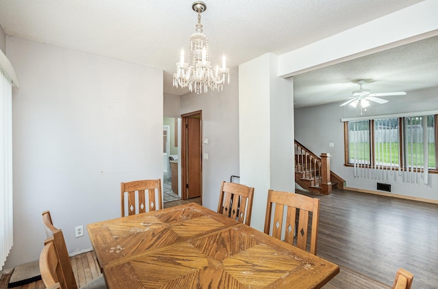 5870 Lynwood Blvd, Mound, MN 55364 - dining space featuring a chandelier, wood finished floors, stairs, and ceiling fan